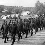 Срби се враћају у бараке, логор у Гувији